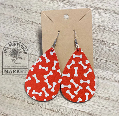Clearance - Orange dog bone earring