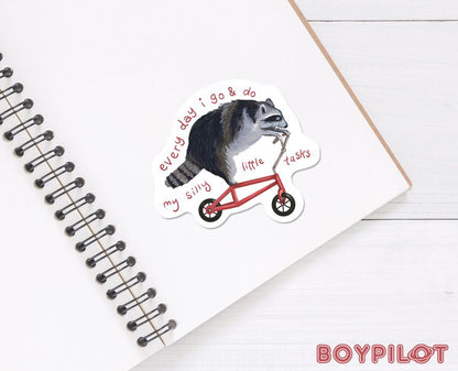 Raccoon on Bike Vinyl Sticker - 3"